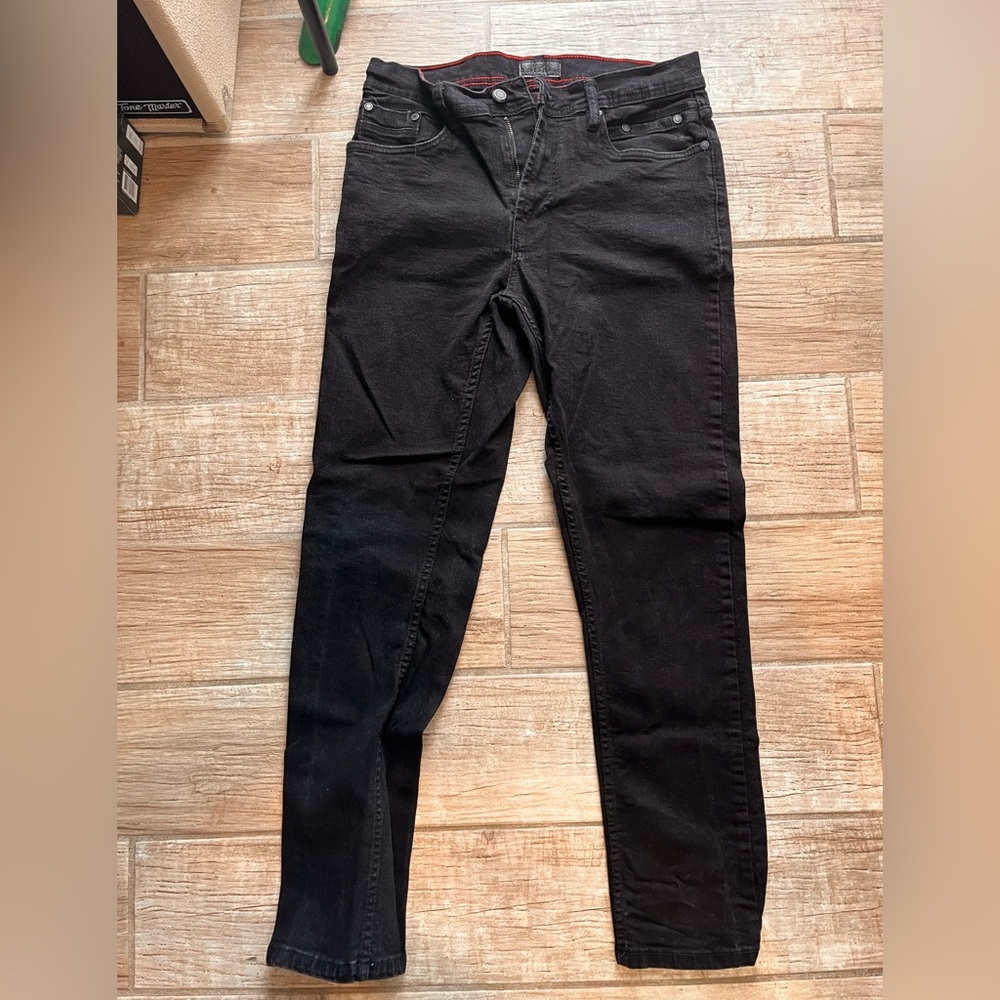 Black men’s jeans barley worn